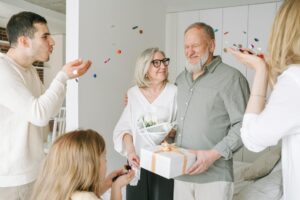 A family celebrating Keiro no Hi with an experience gift for their grandparents