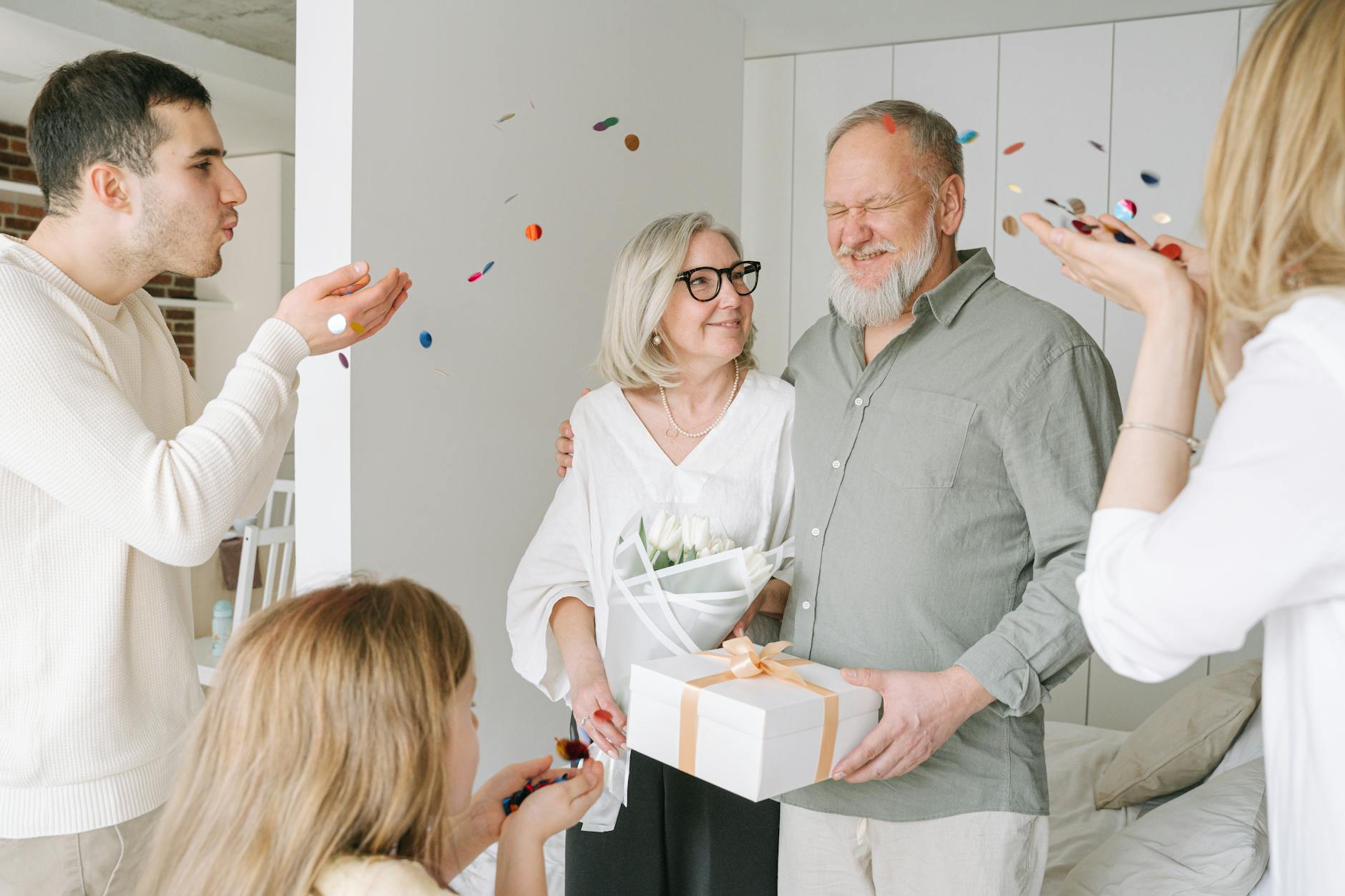 A family celebrating Keiro no Hi with an experience gift for their grandparents