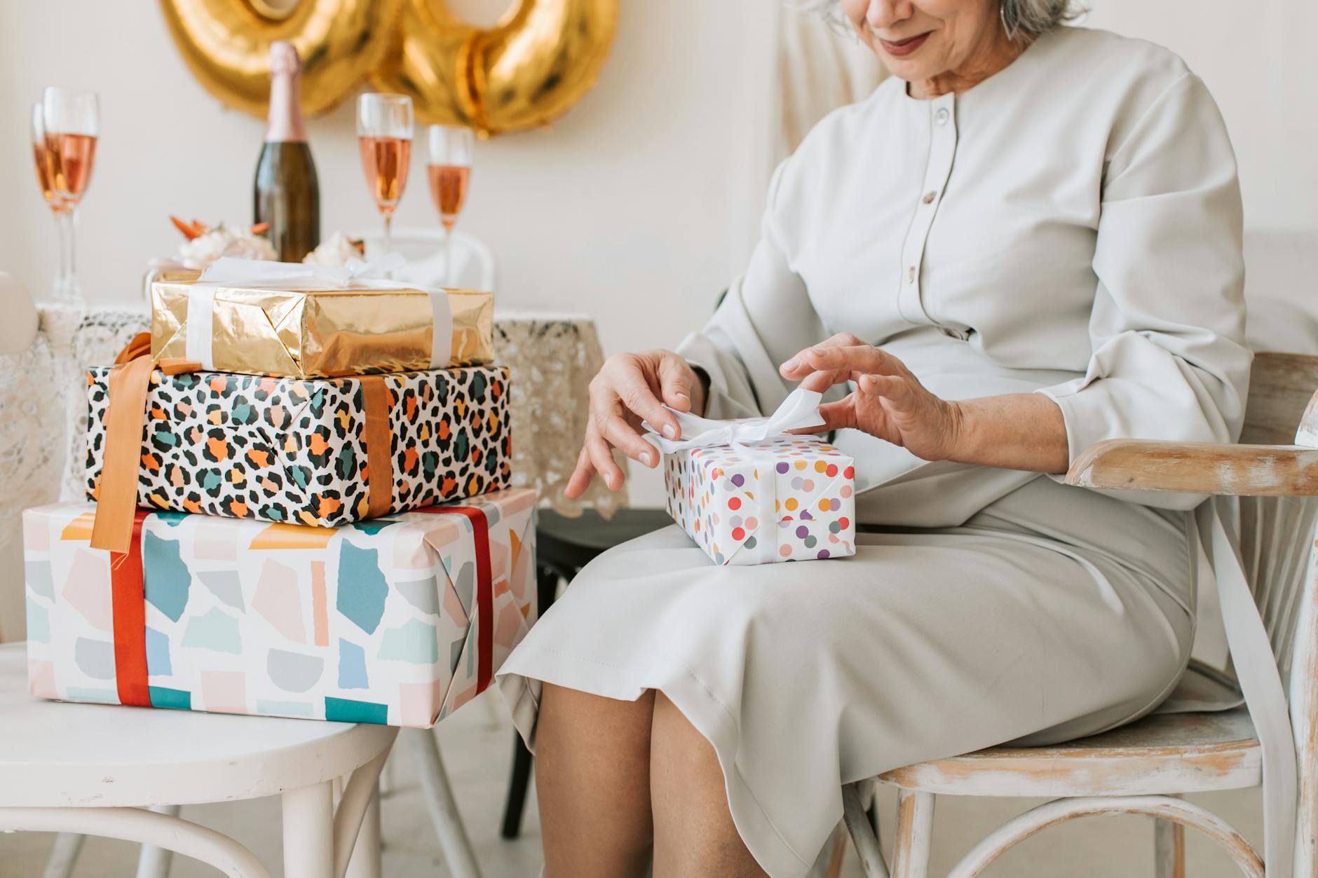 A daughter struggling to choose a gift for her elderly parent in their 80s