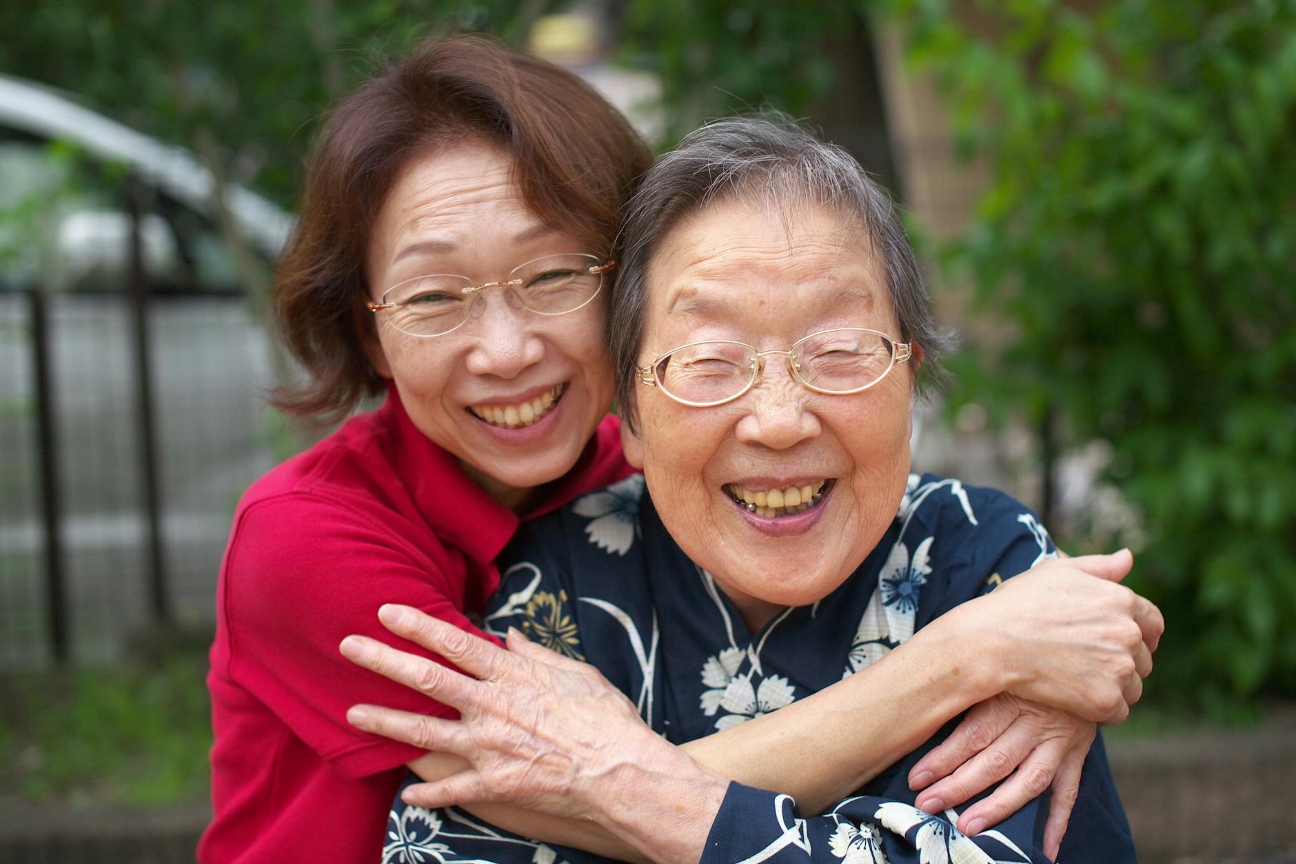A family delivering a meaningful gift that truly lands with their elderly parent