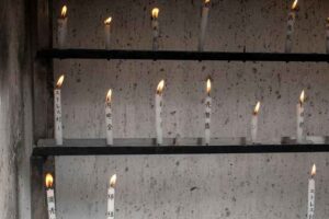 Candle and prayer at a Japanese temple representing Ohenro as a memorial tribute for the deceased