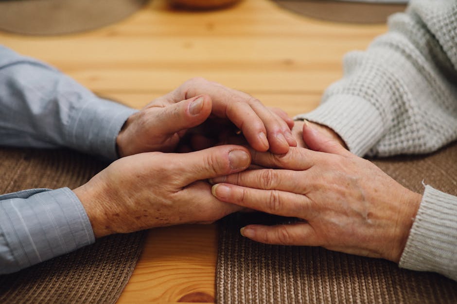 Hands of parent and child symbolizing a meaningful gift for aging parents