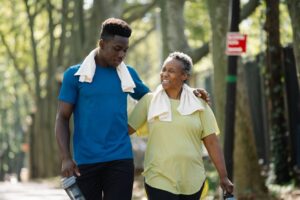 Elderly couple walking together, symbolizing a pilgrimage wish shared across generations