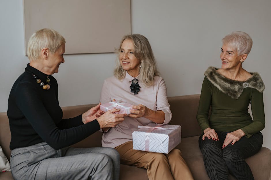 A family celebrating an elder's 60th birthday (kanreki) with gifts and warmth