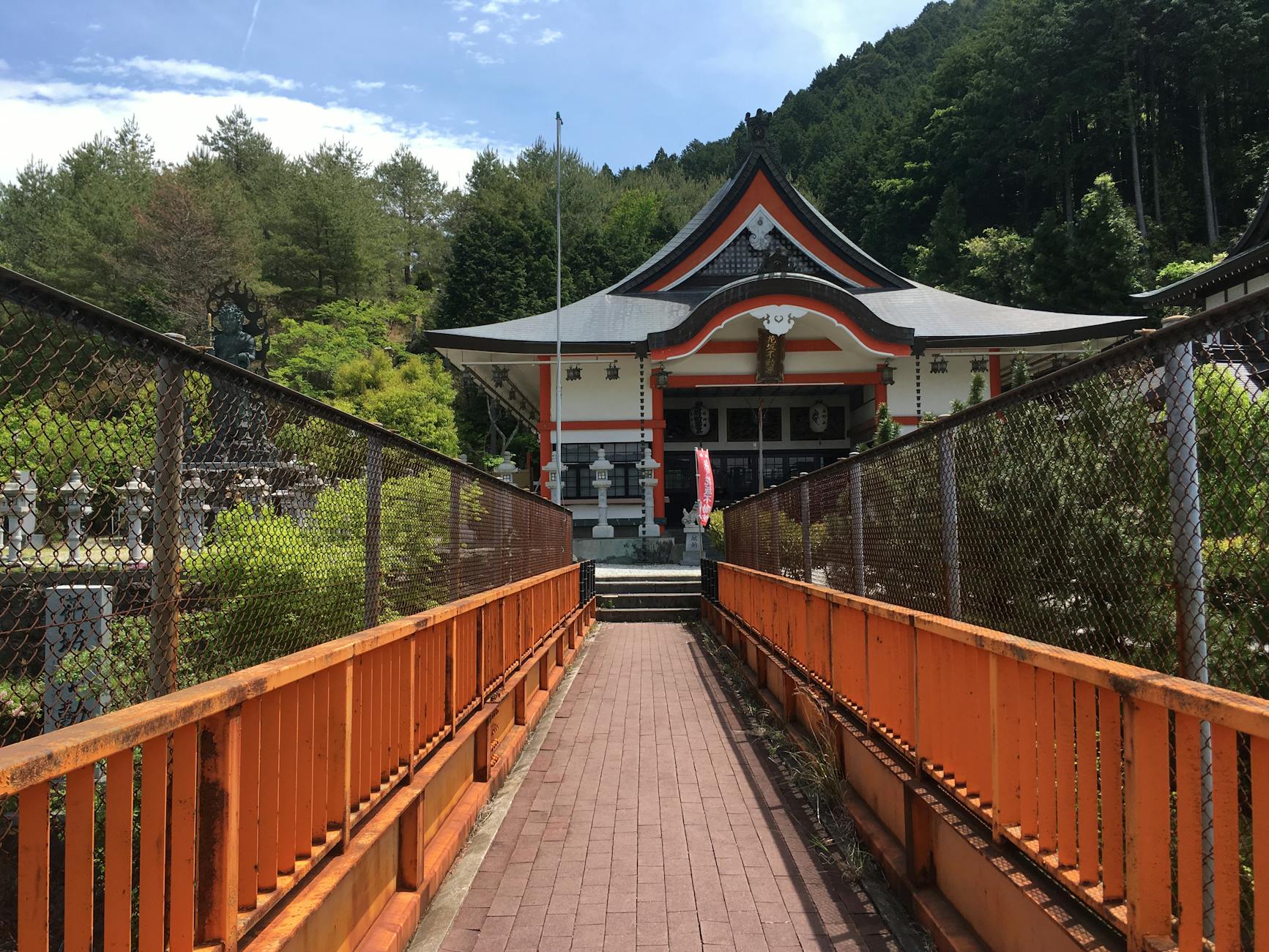 A pilgrim offering prayer at a temple along the Shikoku route