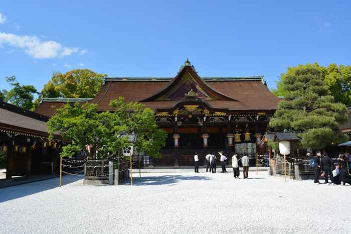 Quiet scene of comparing shrine vs temple for healing prayer