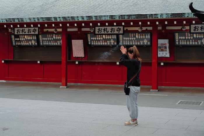 Warm scene of sending real prayer at a place that matches the wish